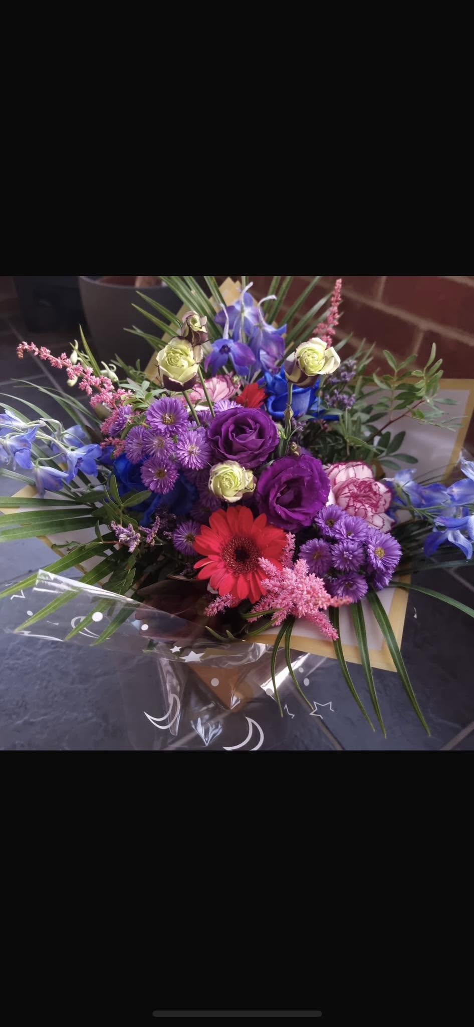 Purple and blue bouquet with delphinium